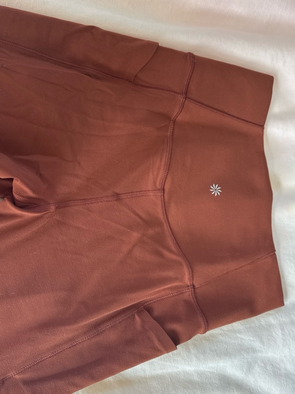 Athleta Burnt Orange High-Rise flare leggings with Pocket